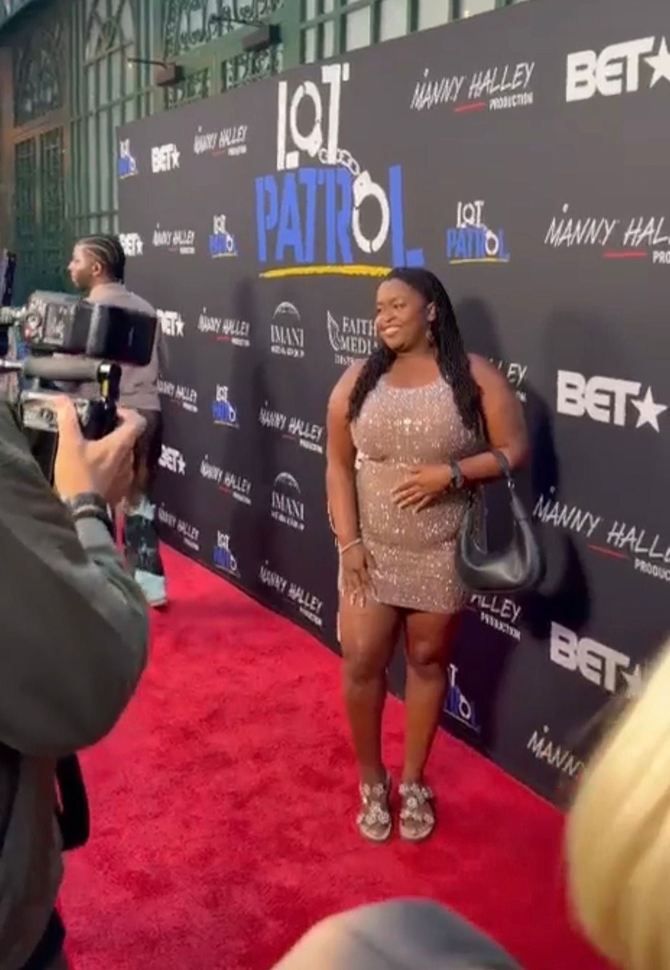 Anyumel Rose, comedian and performer, arriving at the LOT PATROL BET premiere red carpet